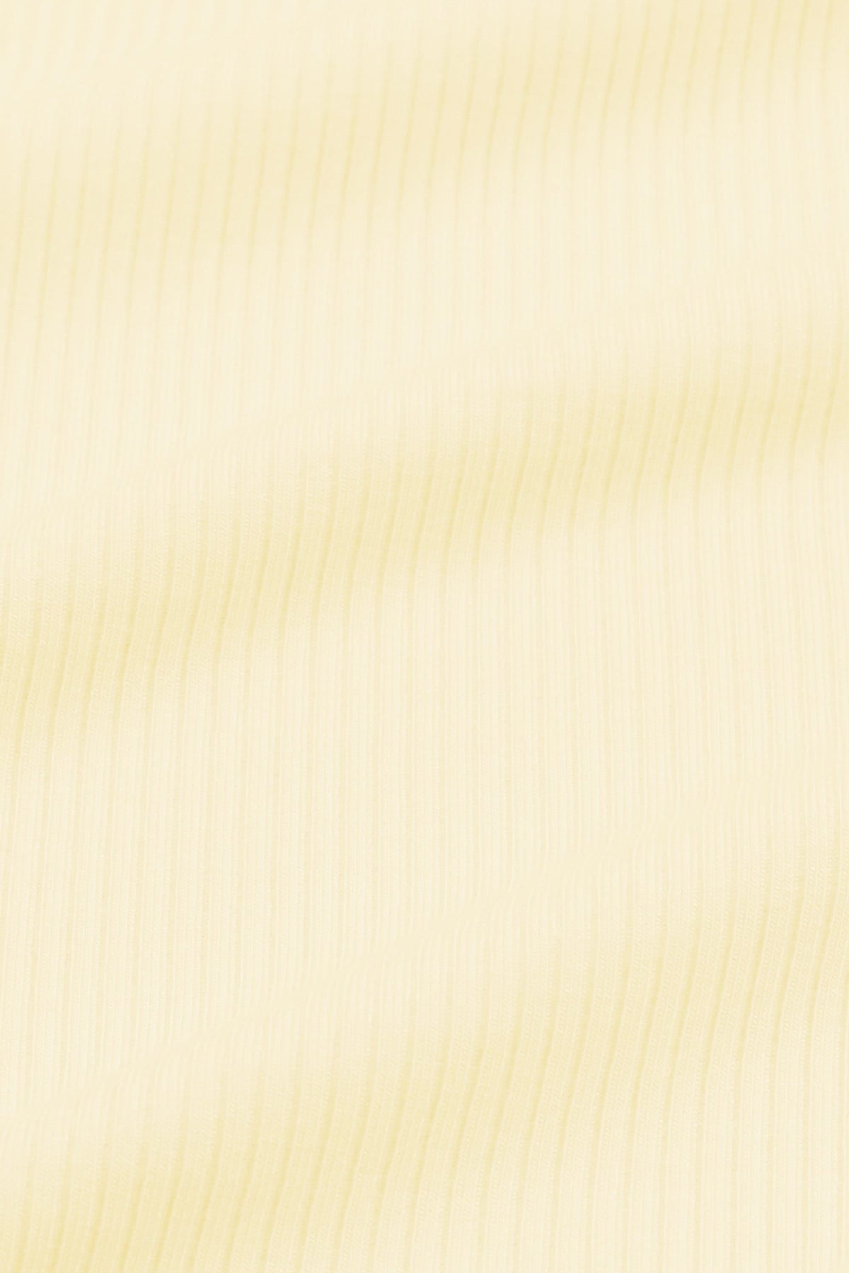 Ribbed Ruffle Zipper Footie in Chamomile